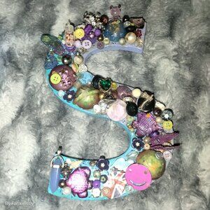 Teens bejeweled letter S